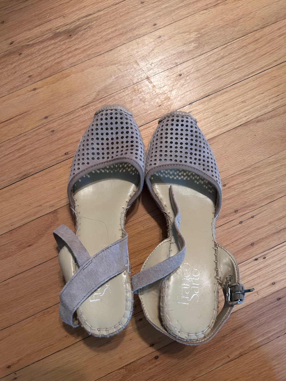 Franco Sarto perforated espadrille sandals with an ankle strap.